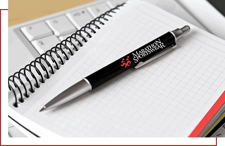 PensPaperCalendars black pen on notebook
