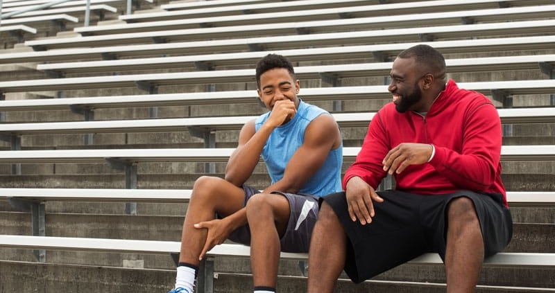 content image Coach spending time mentoring a student athlete