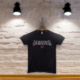 Tshirt on wall with lighting storefront