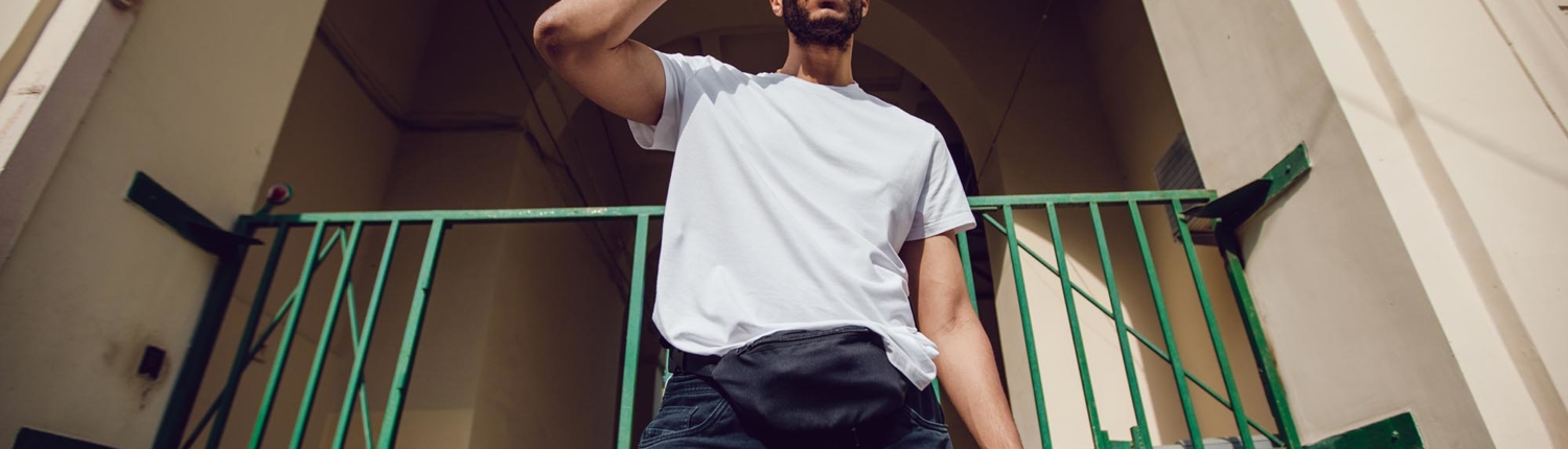 Image of a person wearing a white oversized tshirt